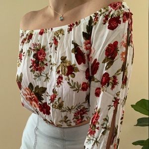 White blouse with red roses
